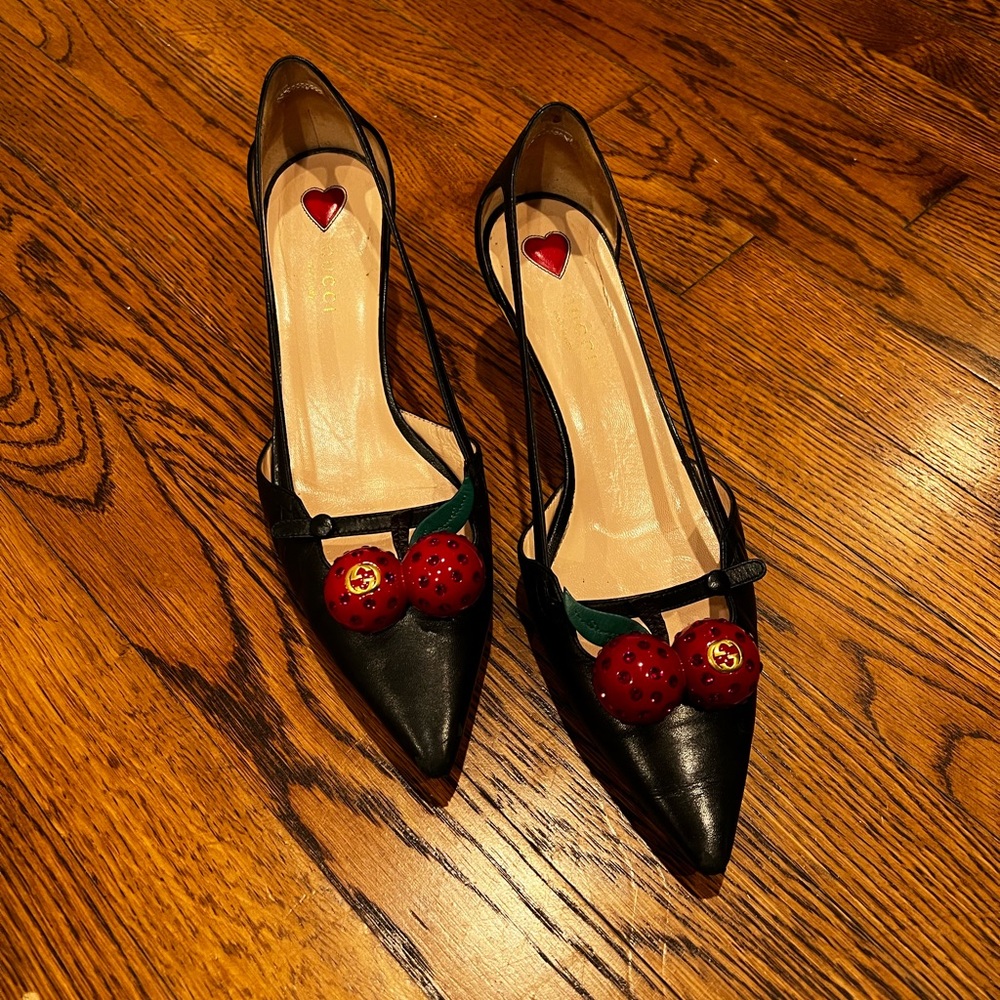 These gorgeous Gucci low heels with fun cherries on top are hard to find!